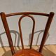 pair of bistro chairs, curved wood and pattern on the seat