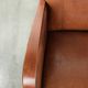 Sheepskin armchair in Art Deco style with wooden armrests