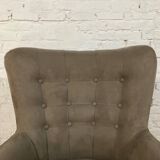 Swivel armchair in velvet fabric and metal