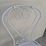 Pair of wrought iron garden chairs, antique manufacture