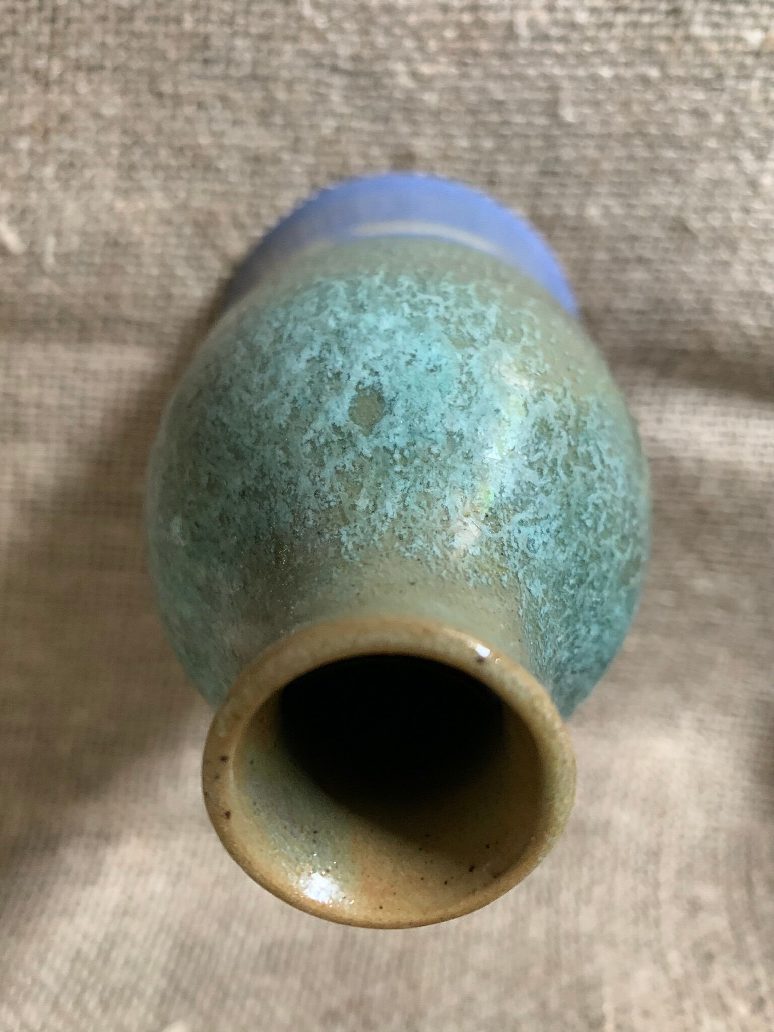 Vase in blue enamelled sandstone sign