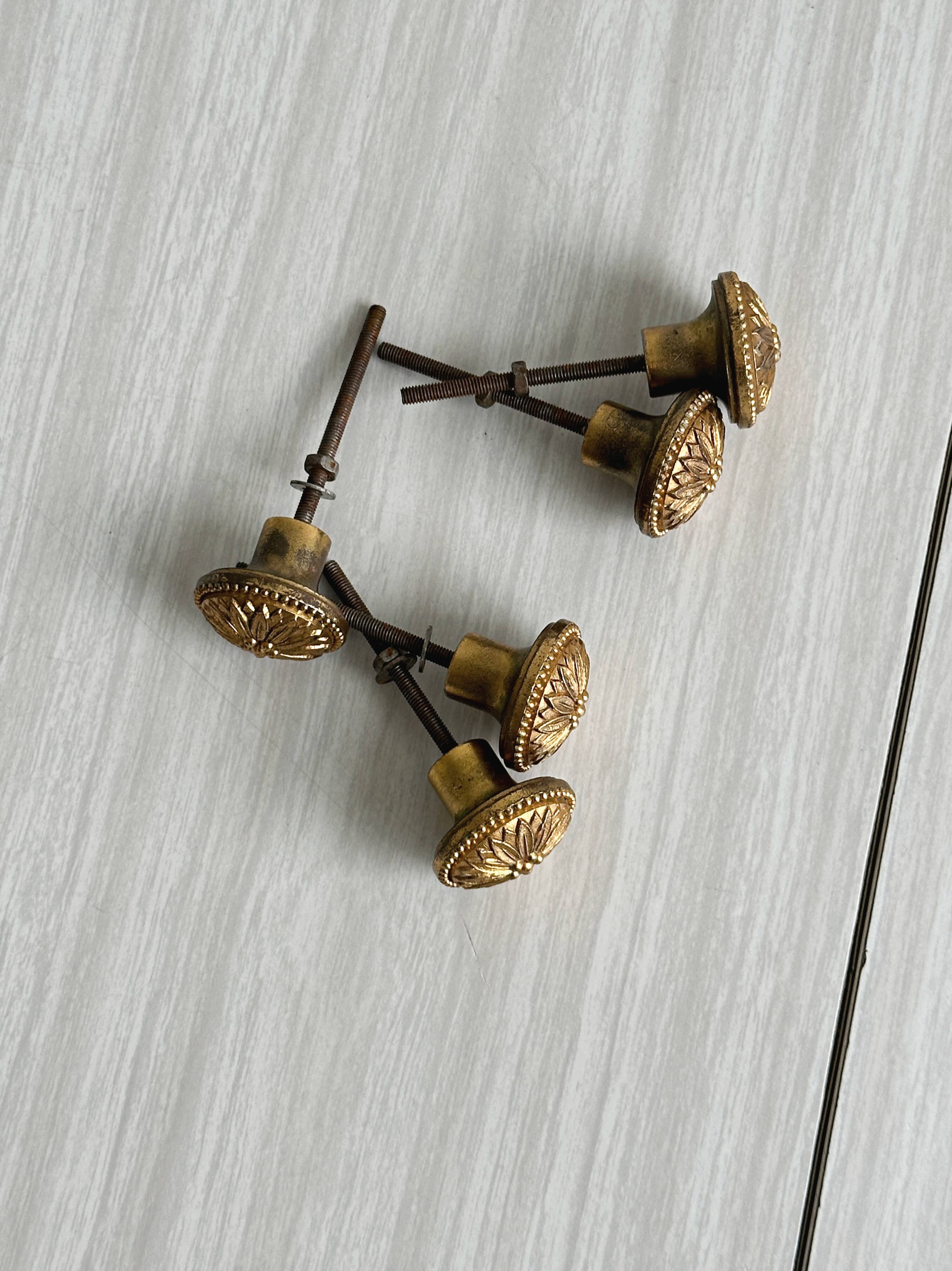 Set of 5 antique brass furniture knobs