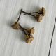 Set of 5 antique brass furniture knobs