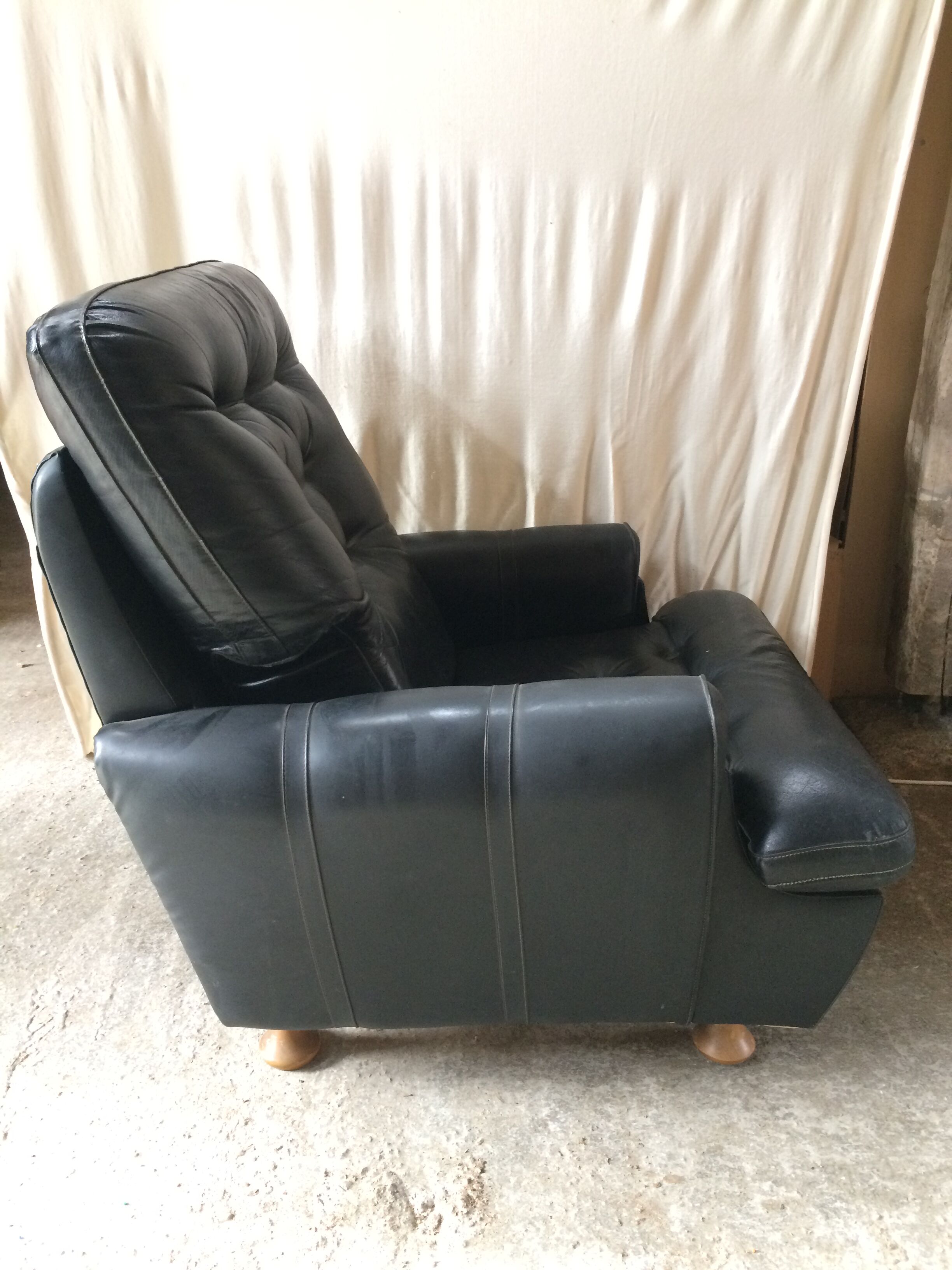 Former black leather chair