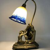 Vintage bronze table lamp featuring a painter on a mirror from the 1960s.