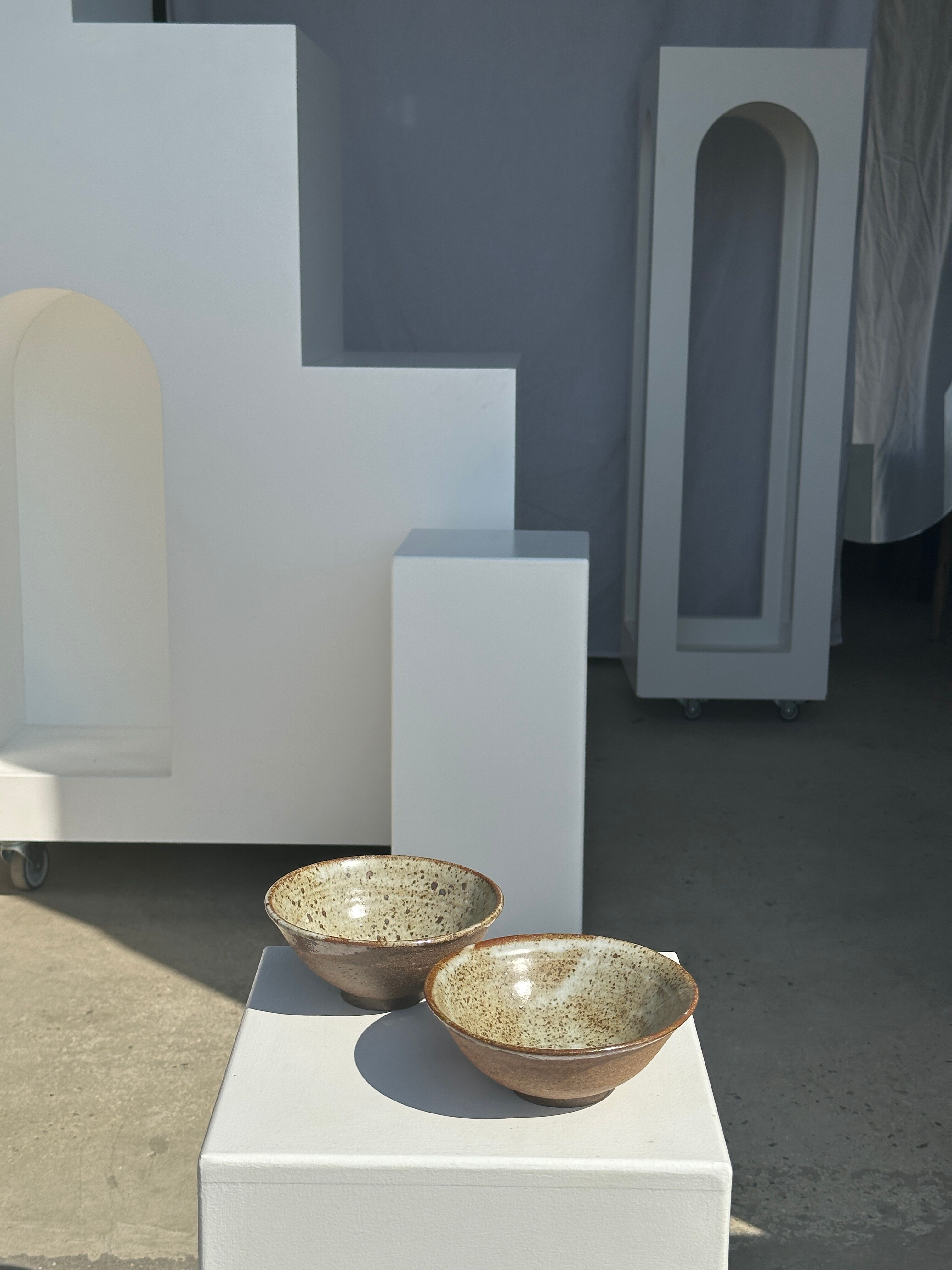 Duo of ceramic bowls interior glazed exterior matt raw earth