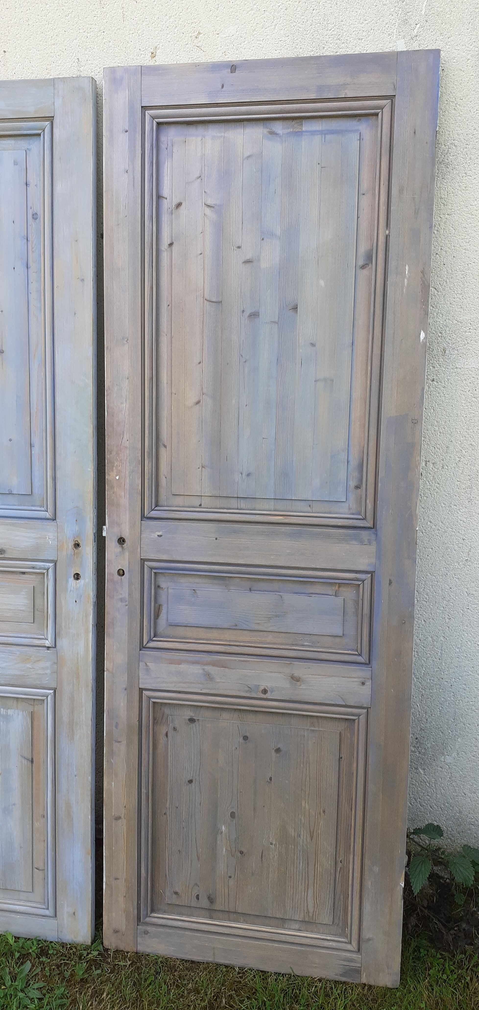 Pairs of Haussmannian doors in patinated aged wood