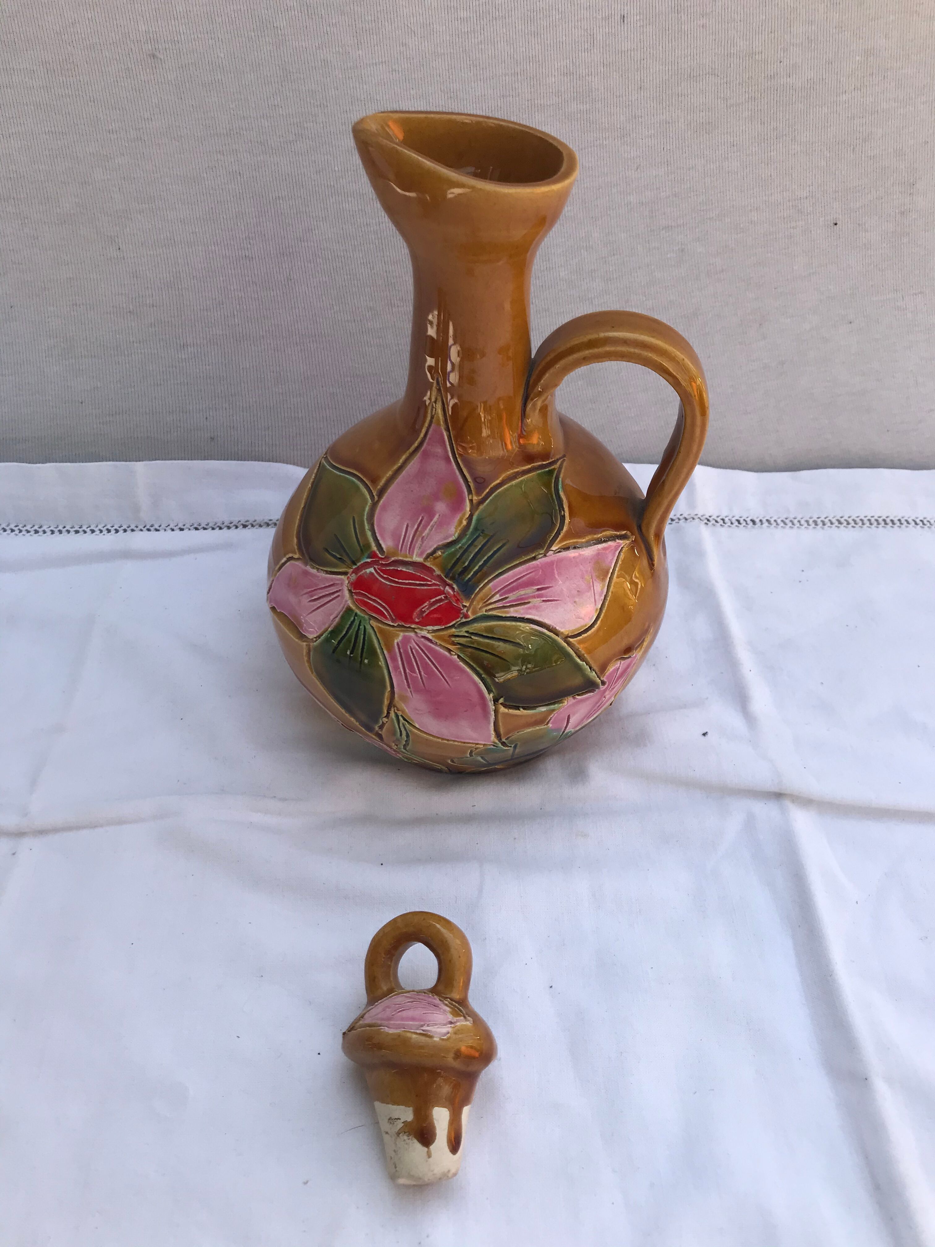 Old carafe with 8 ceramic glasses