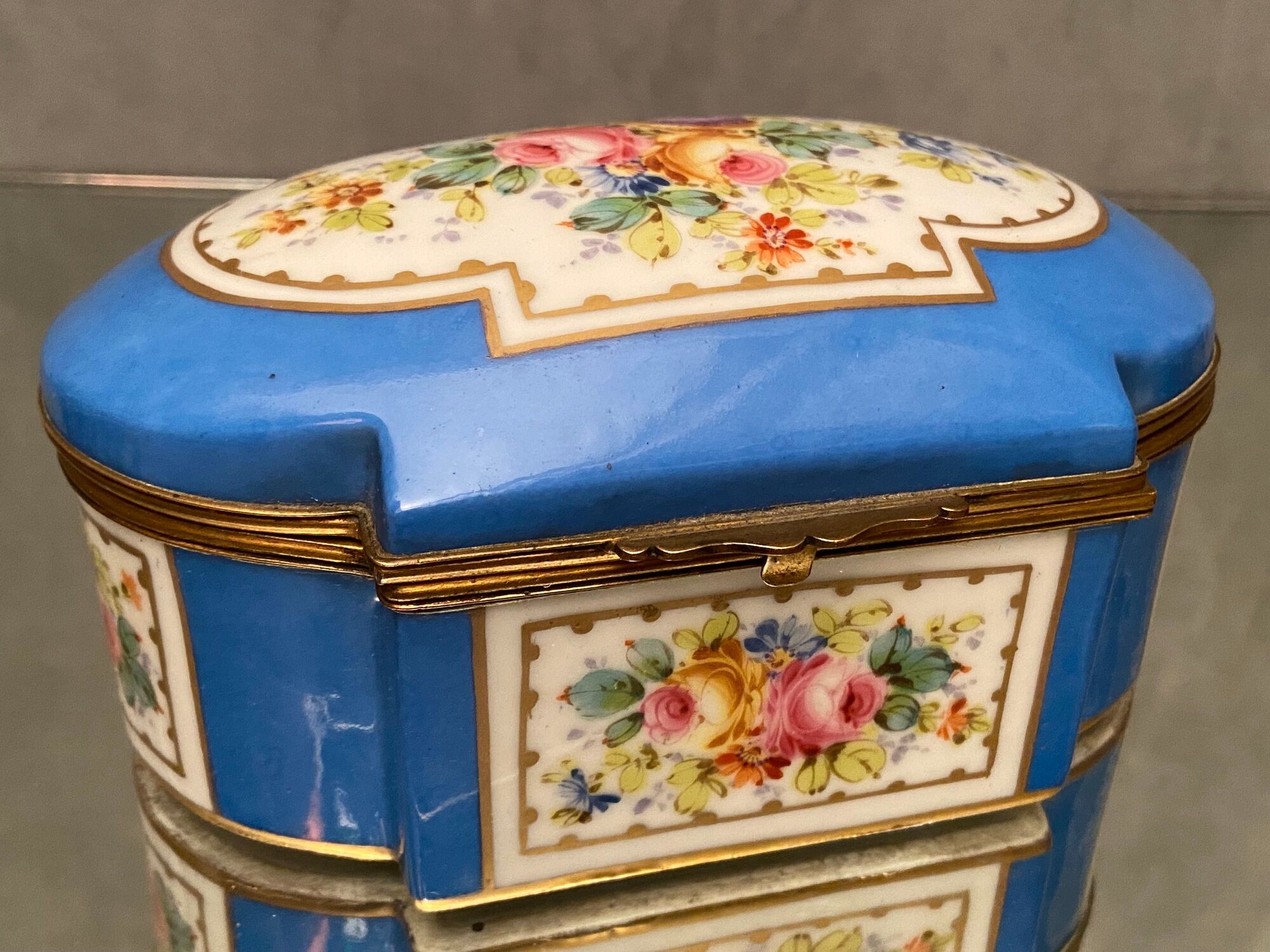 Domed porcelain box polychrome floral decoration on blue background brand Sèvres
