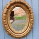 Miroir ancien en bois doré