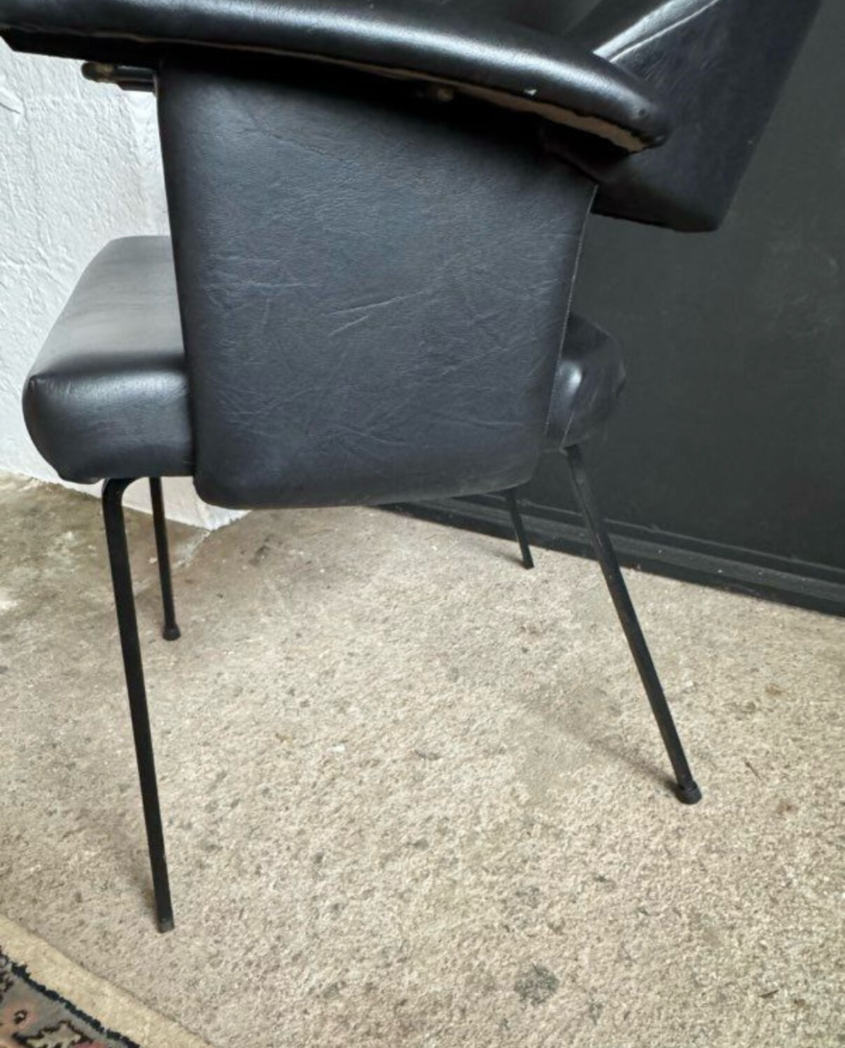 Black armchair from the 1950s