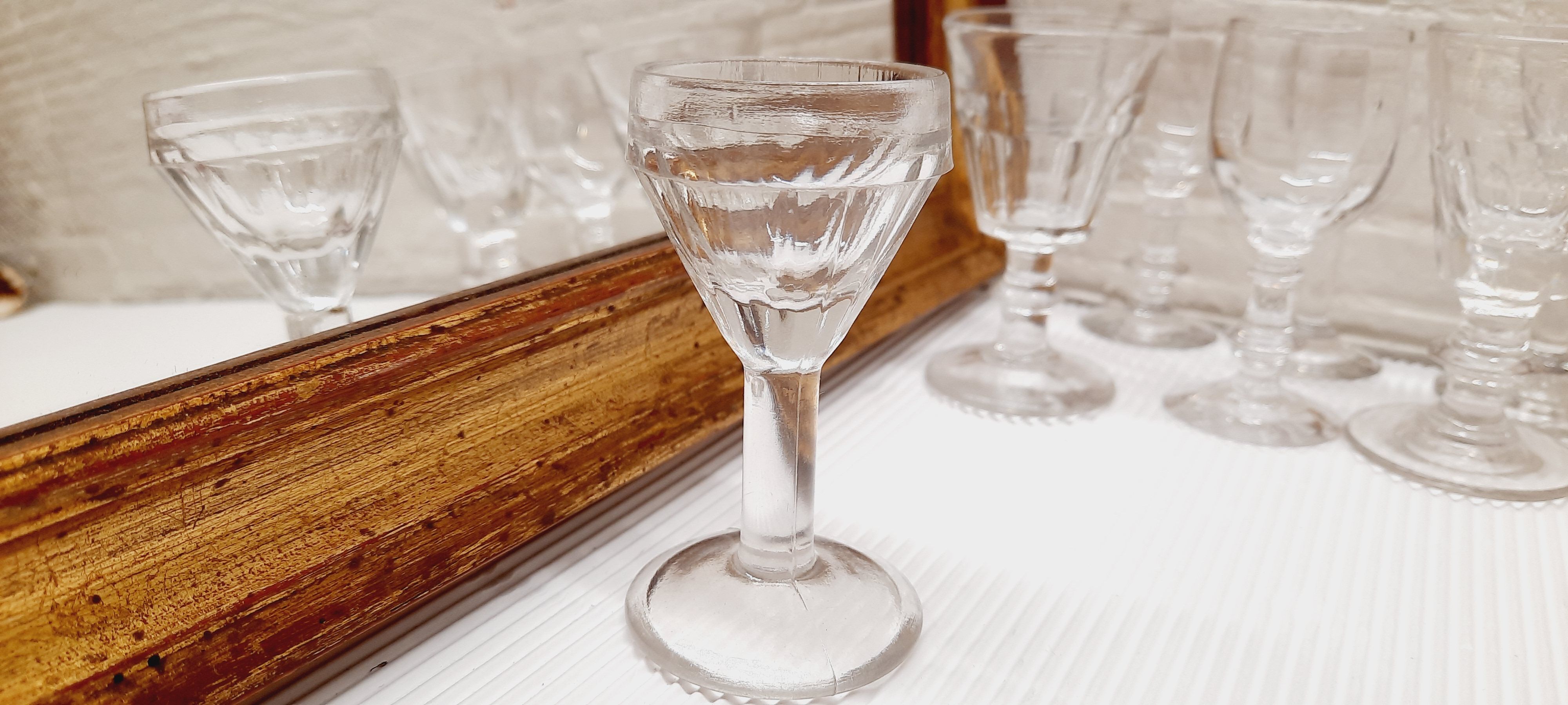 Lot 9 mismatched digestive glasses
