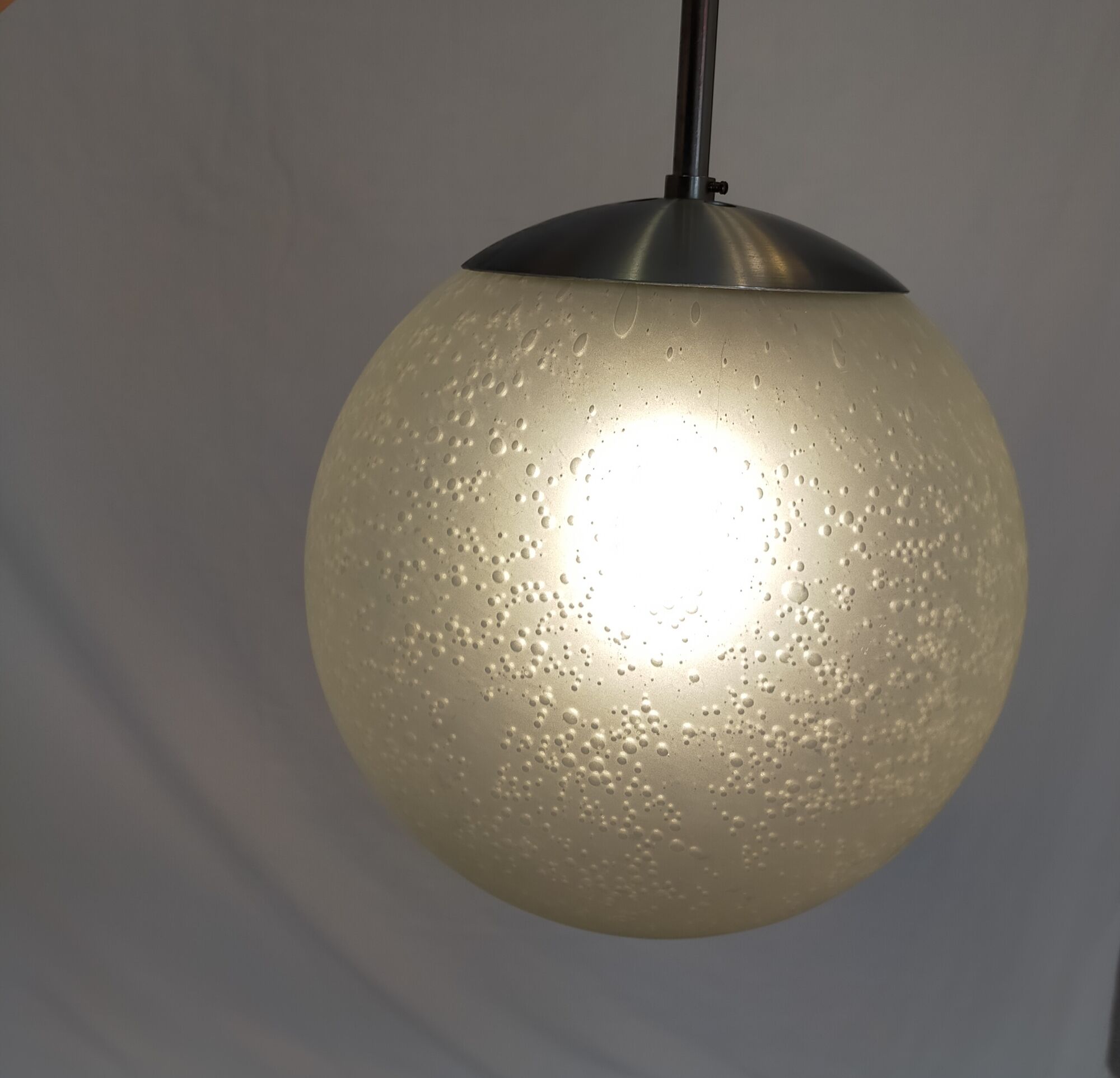 Suspension in blown and sandblasted glass, by Raak, from the 70s
