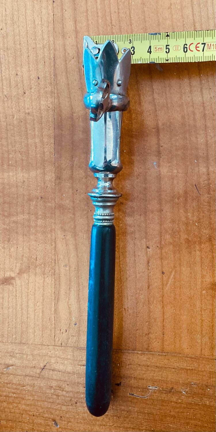 Napoleon III leg of lamb fork from the 19th century with a silver-plated handle and an ebony handle.