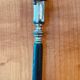 Napoleon III leg of lamb fork from the 19th century with a silver-plated handle and an ebony handle.