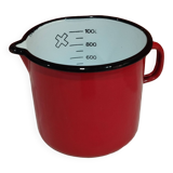 graduated measuring pitcher in red enamelled sheet metal