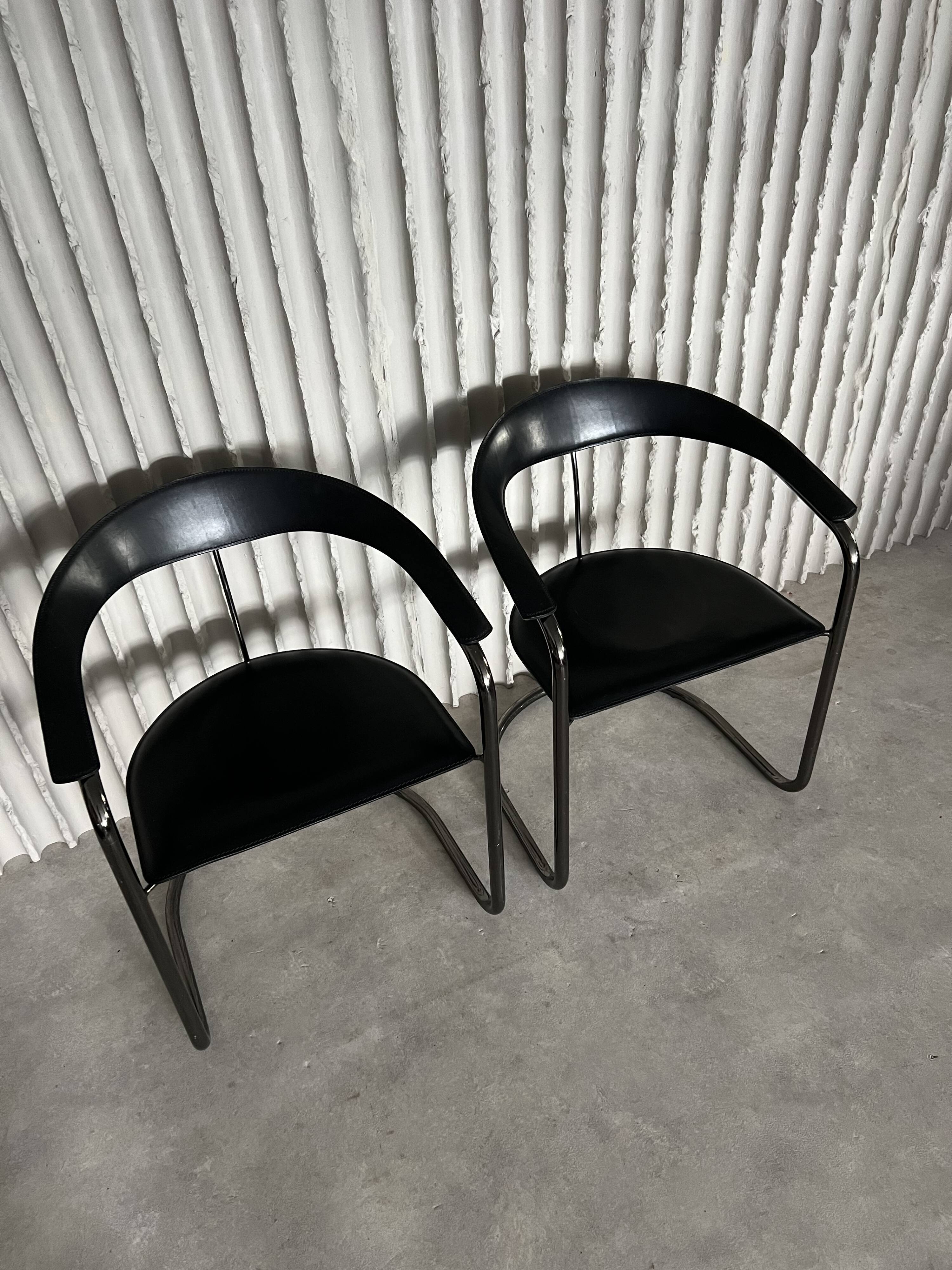 Set of 3 leather Arrben chairs (only 2 in the photo)