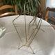 Vintage gold metal magazine rack