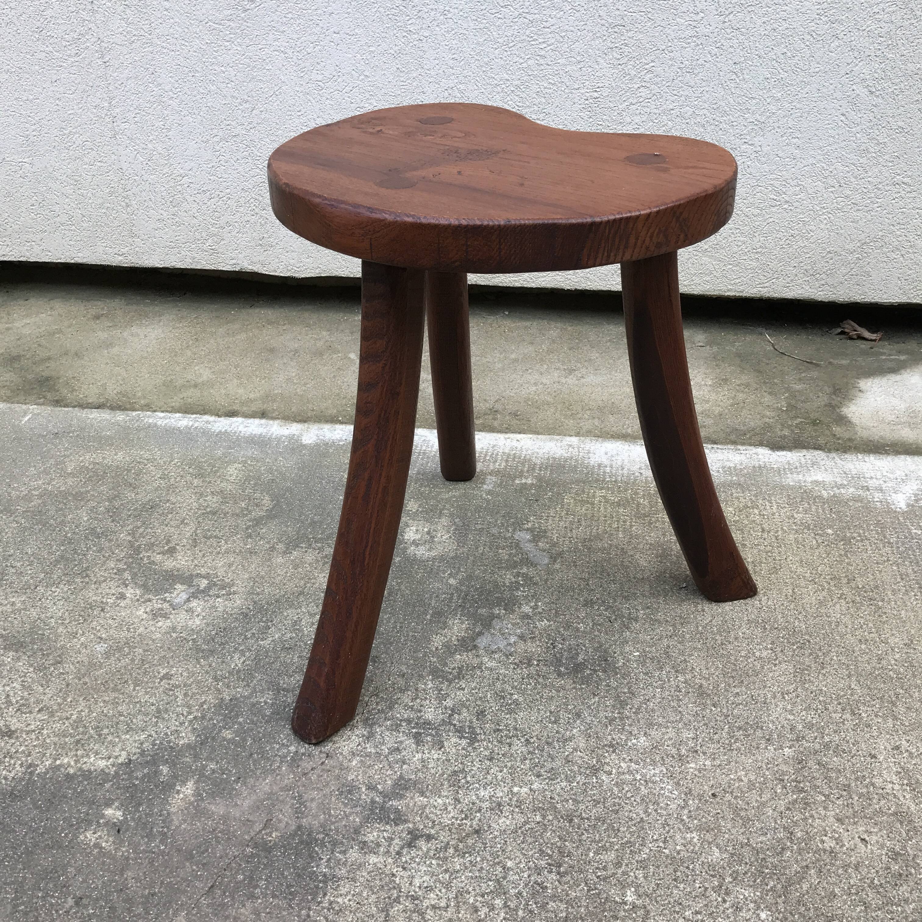 Brutalist tripod standing farm stool