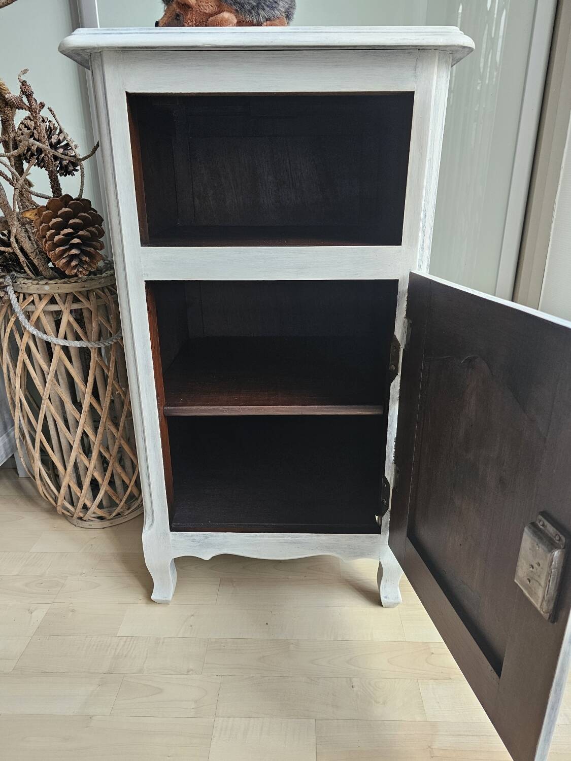 Two solid wood bedside tables with calfskin decoration.