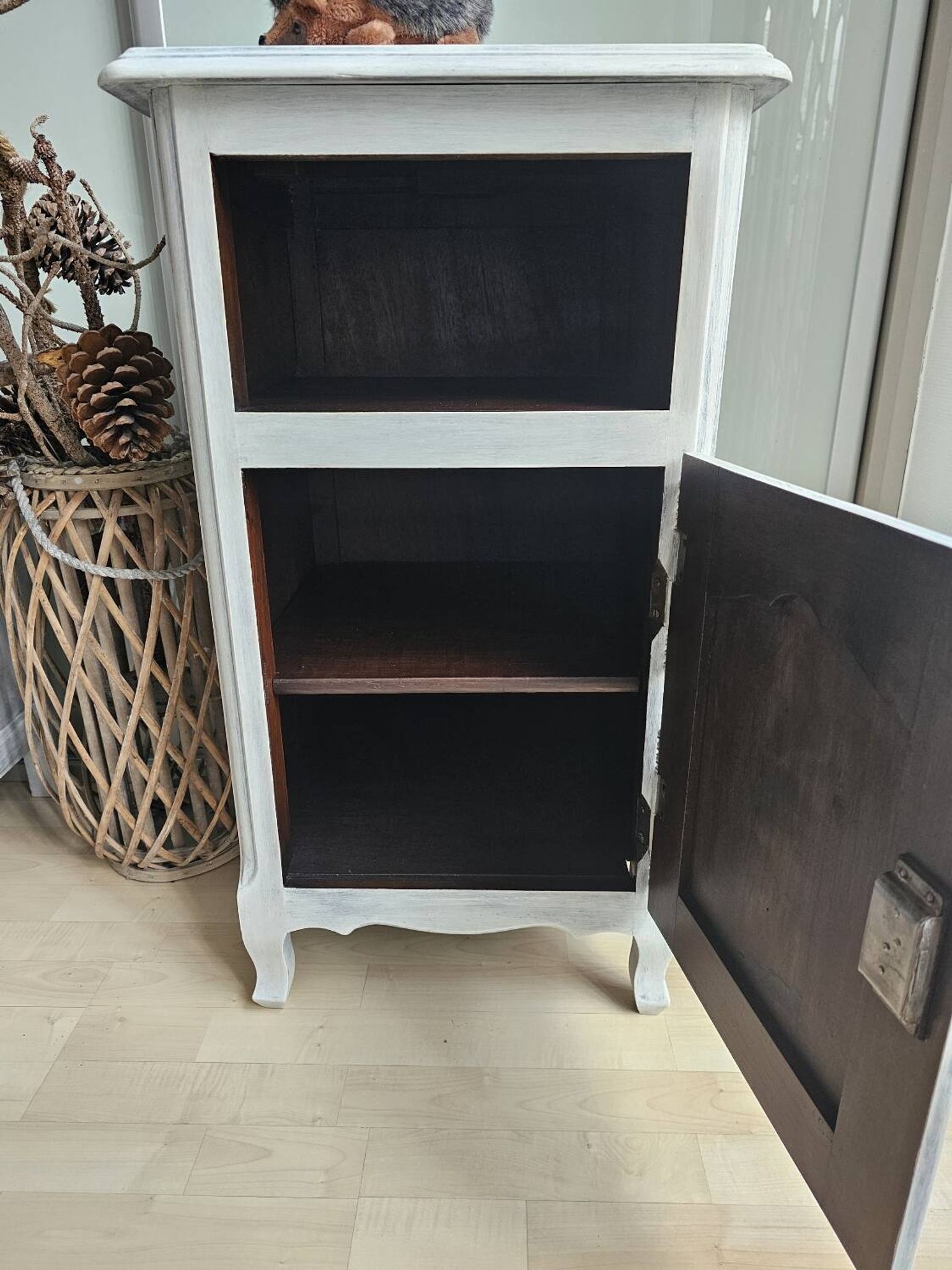 Two solid wood bedside tables with calfskin decoration.