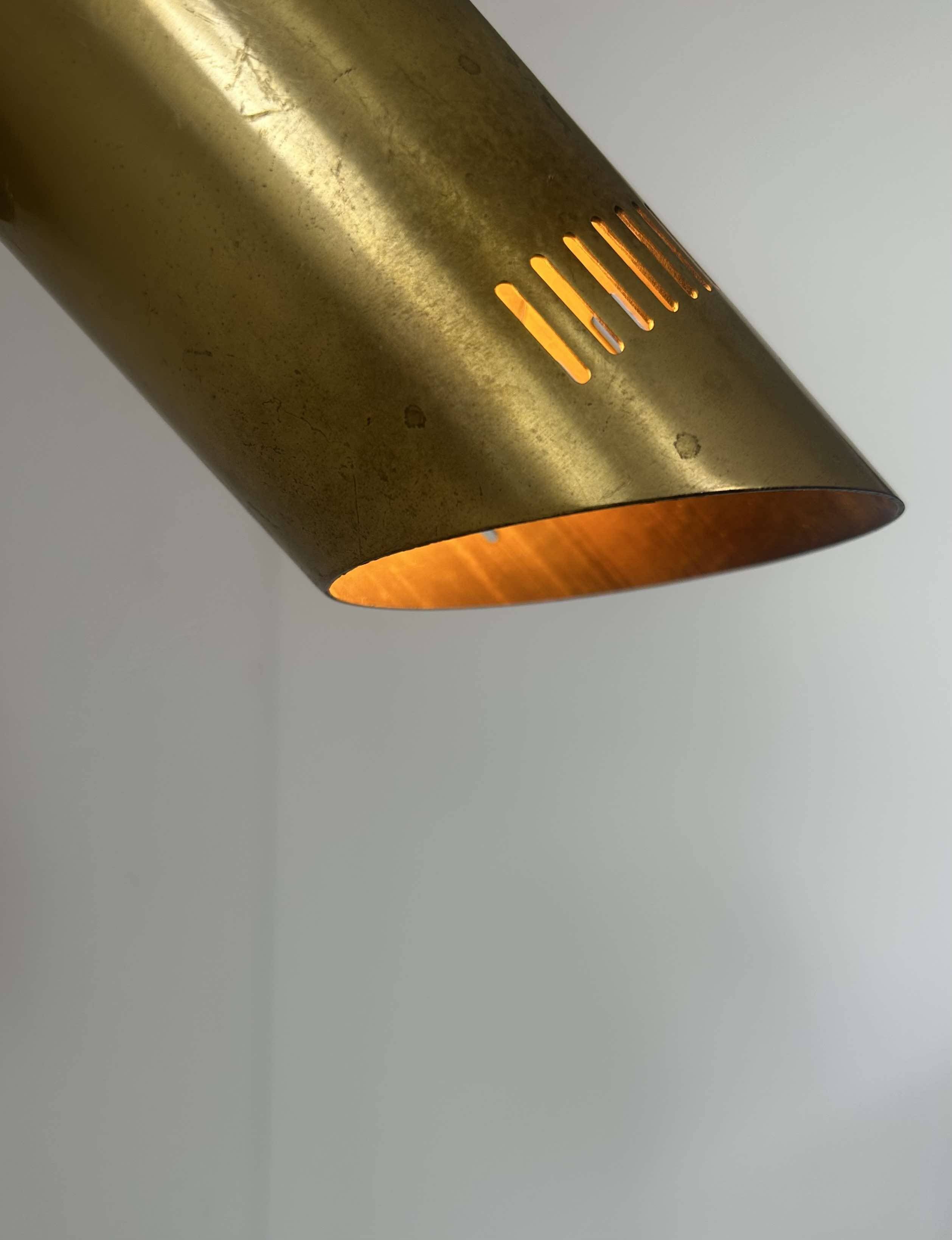 Vintage adjustable wall light, solid perforated brass, France 1960