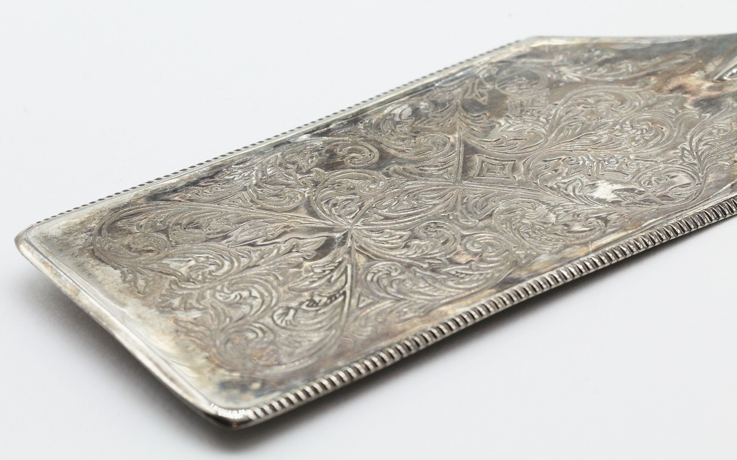 Old silver metal pie shovel