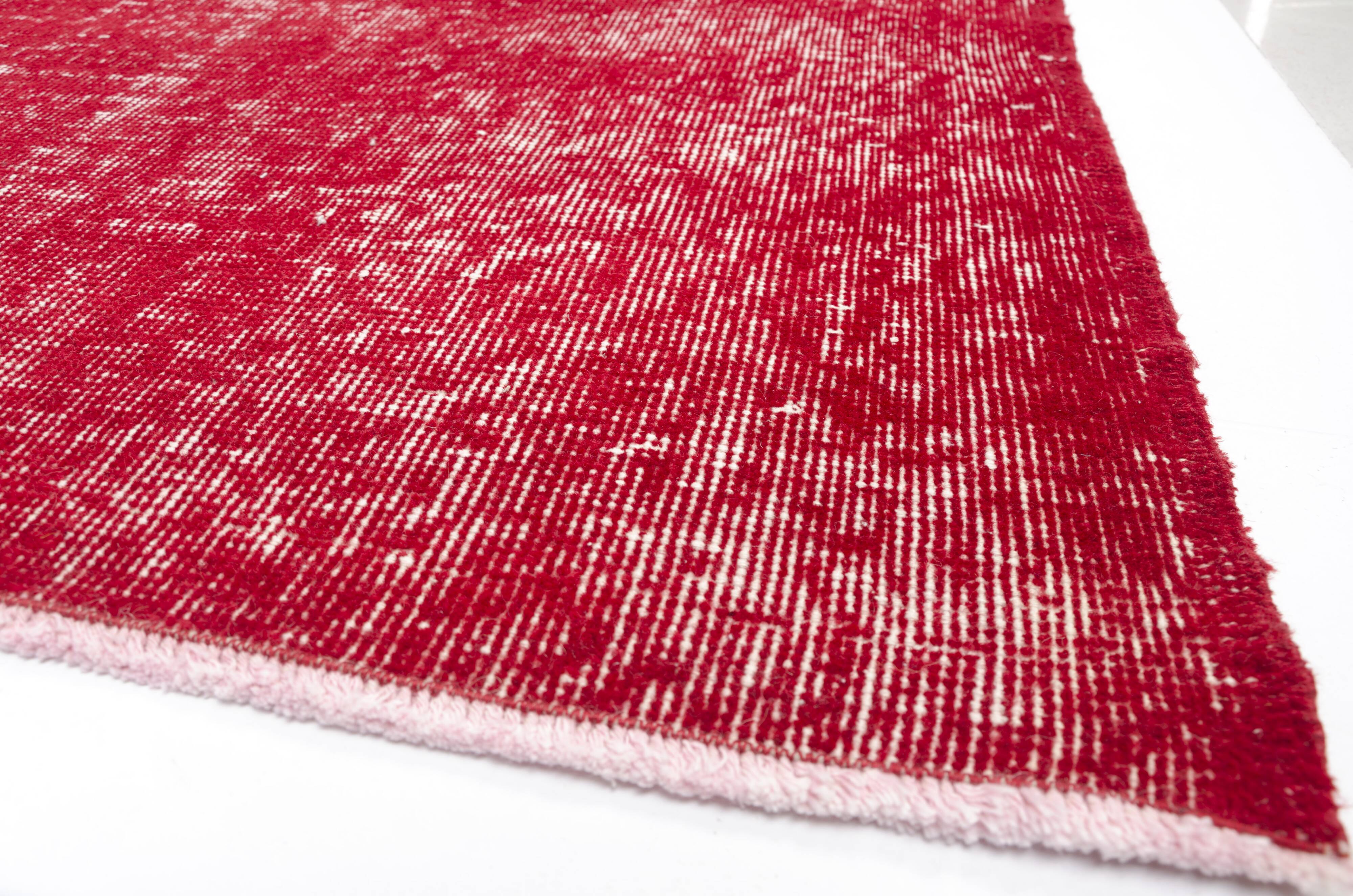 Tapis rouge turc vintage à motif floral