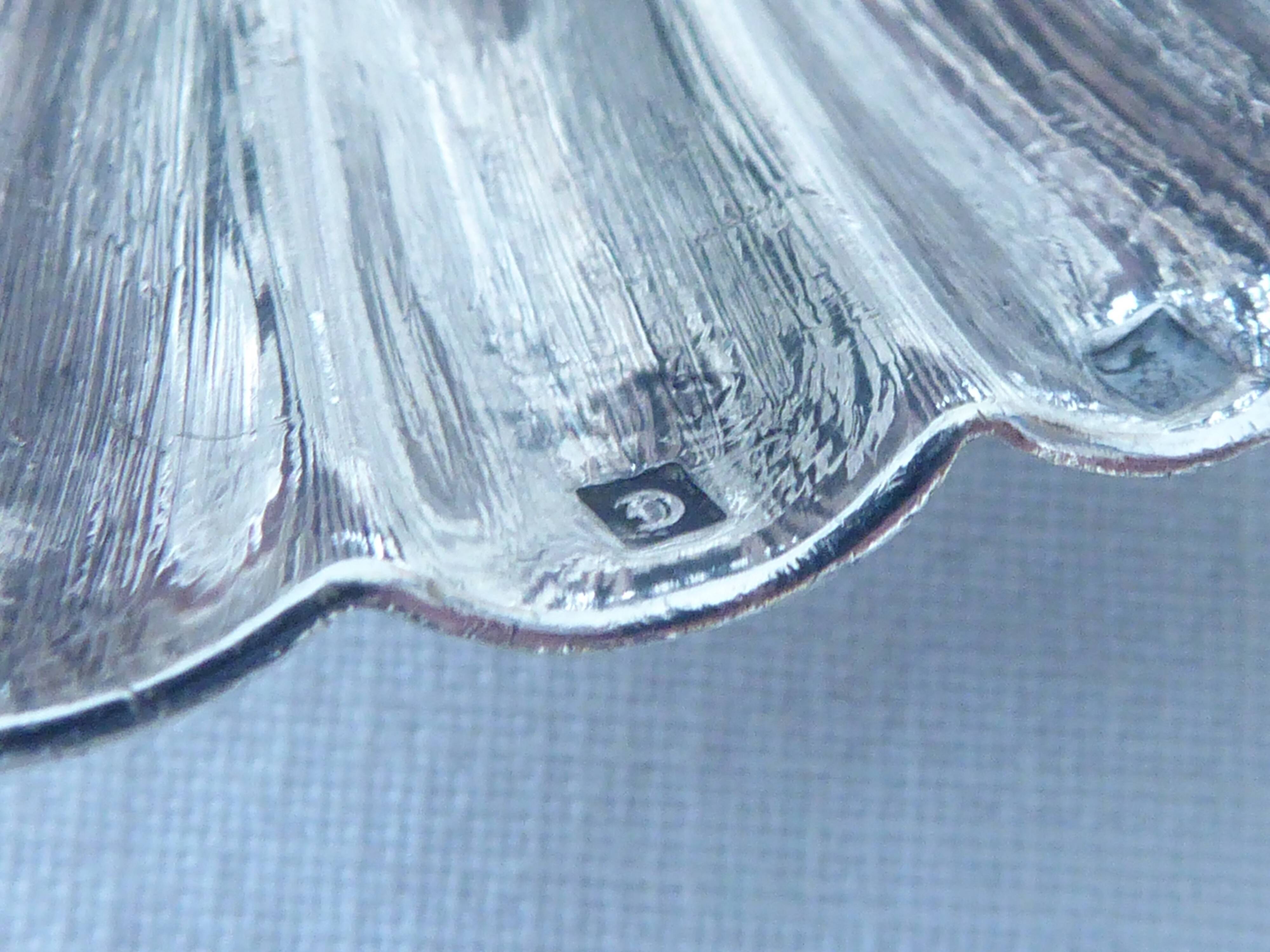 Silver metal sauce ladle