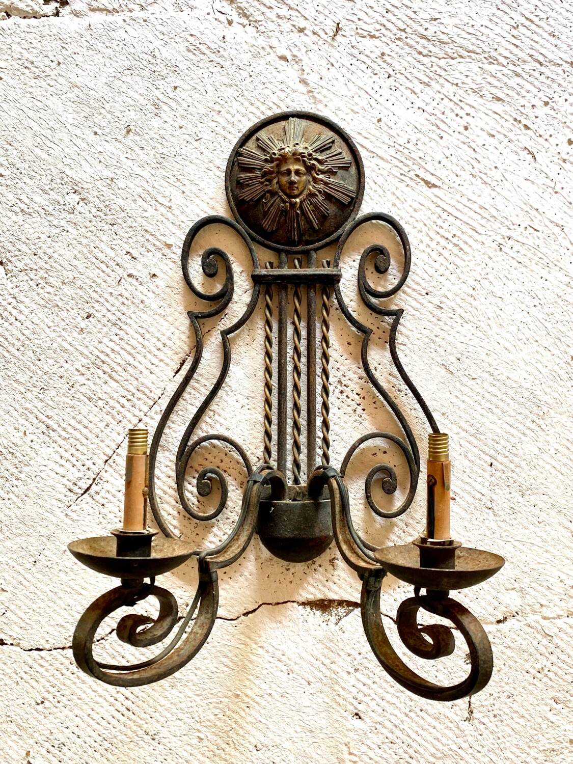 Pair of neoclassical wrought iron wall lights