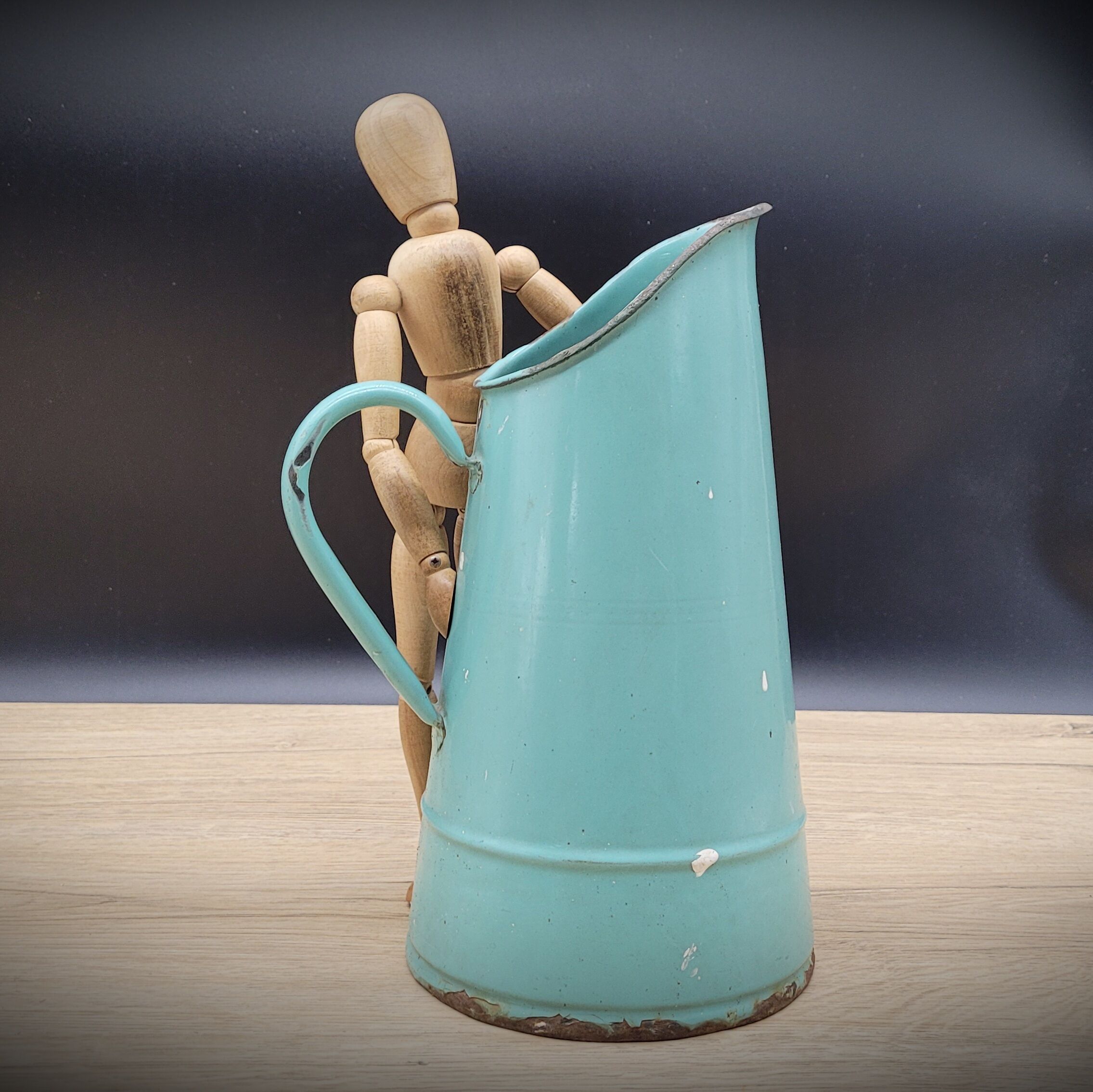 Green enamelled pitcher