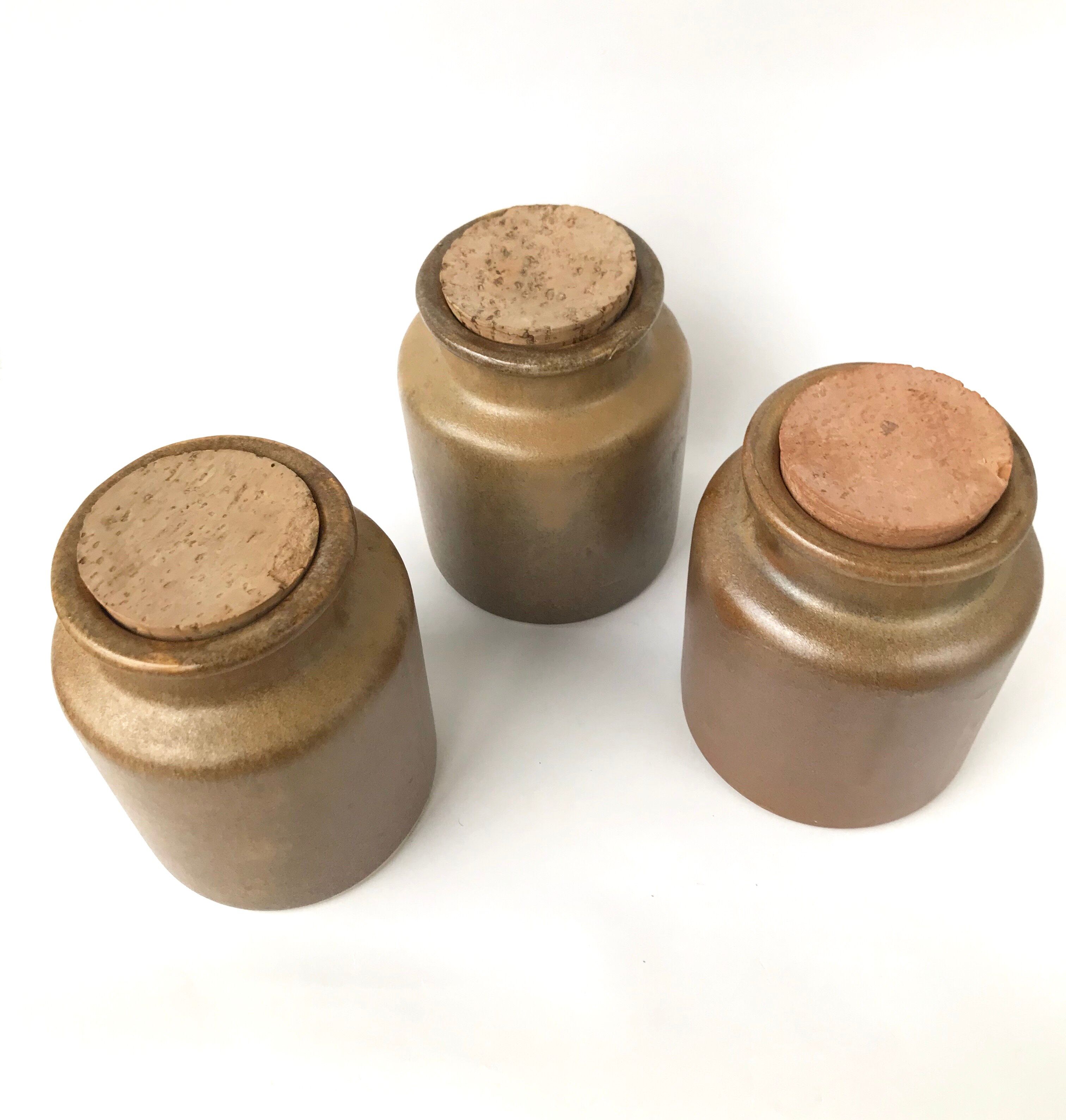 Set of 3 varnished sandstone pots