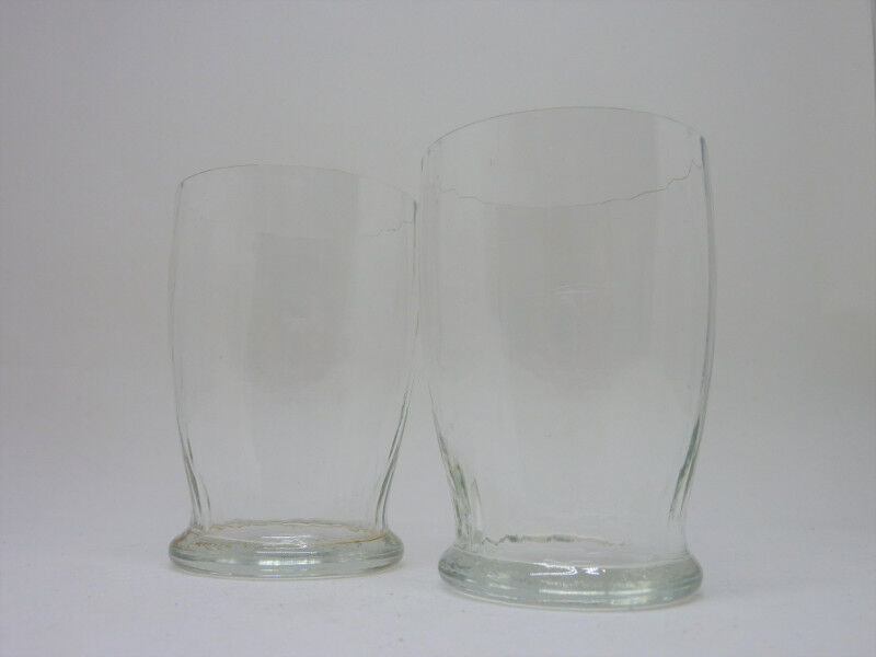 2 old faceted glasses
