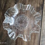 Cup, empty pockets in voluted molded glass decoration stars