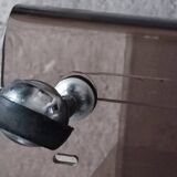 Michel Dumas smoked Plexiglas rolling table.