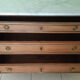 Commode de style louis XVI en bois fruitier massif.