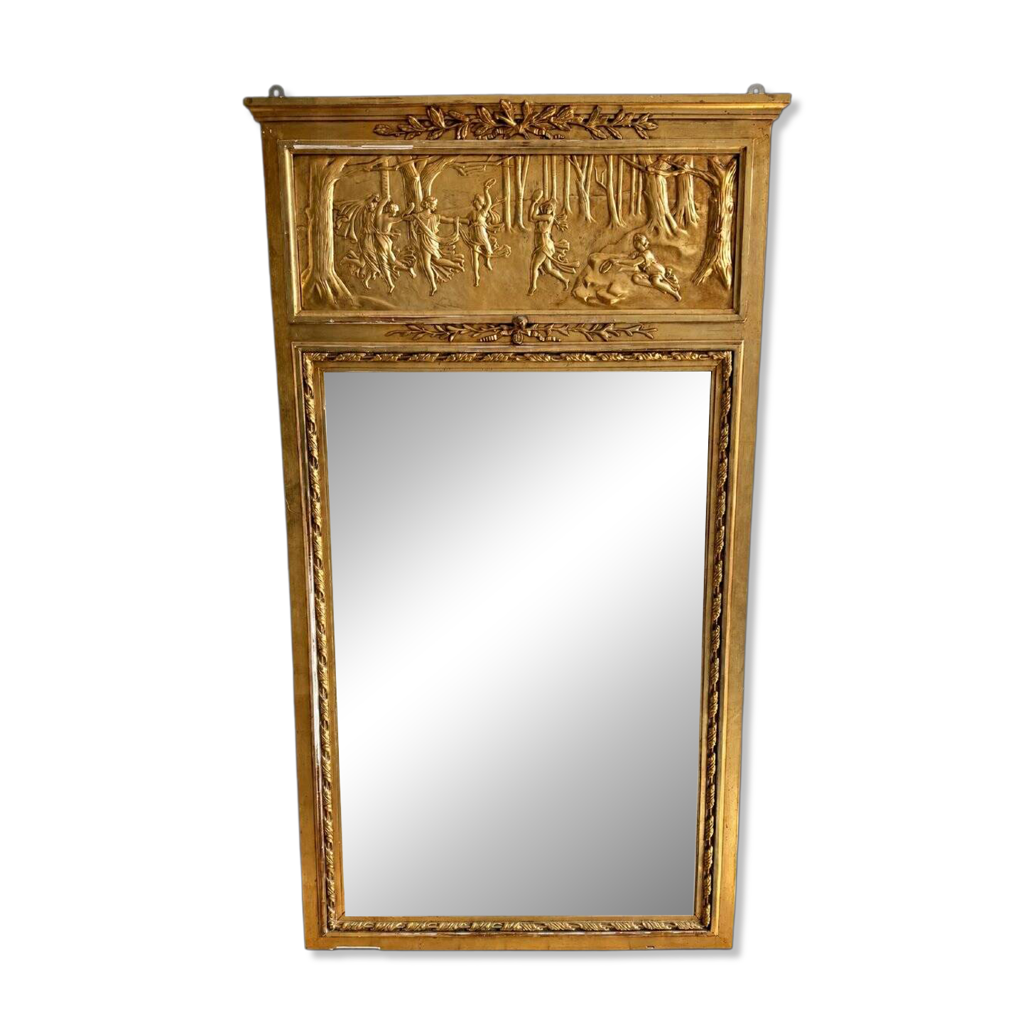 Gilded trumeau in the Louis XVI style with curious decorations.