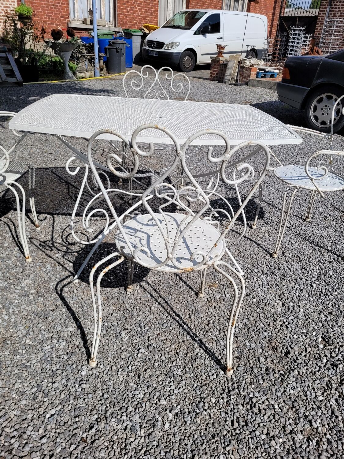 Old wrought iron garden furniture, table + 2 armchairs + 2 chairs