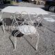 Old wrought iron garden furniture, table + 2 armchairs + 2 chairs