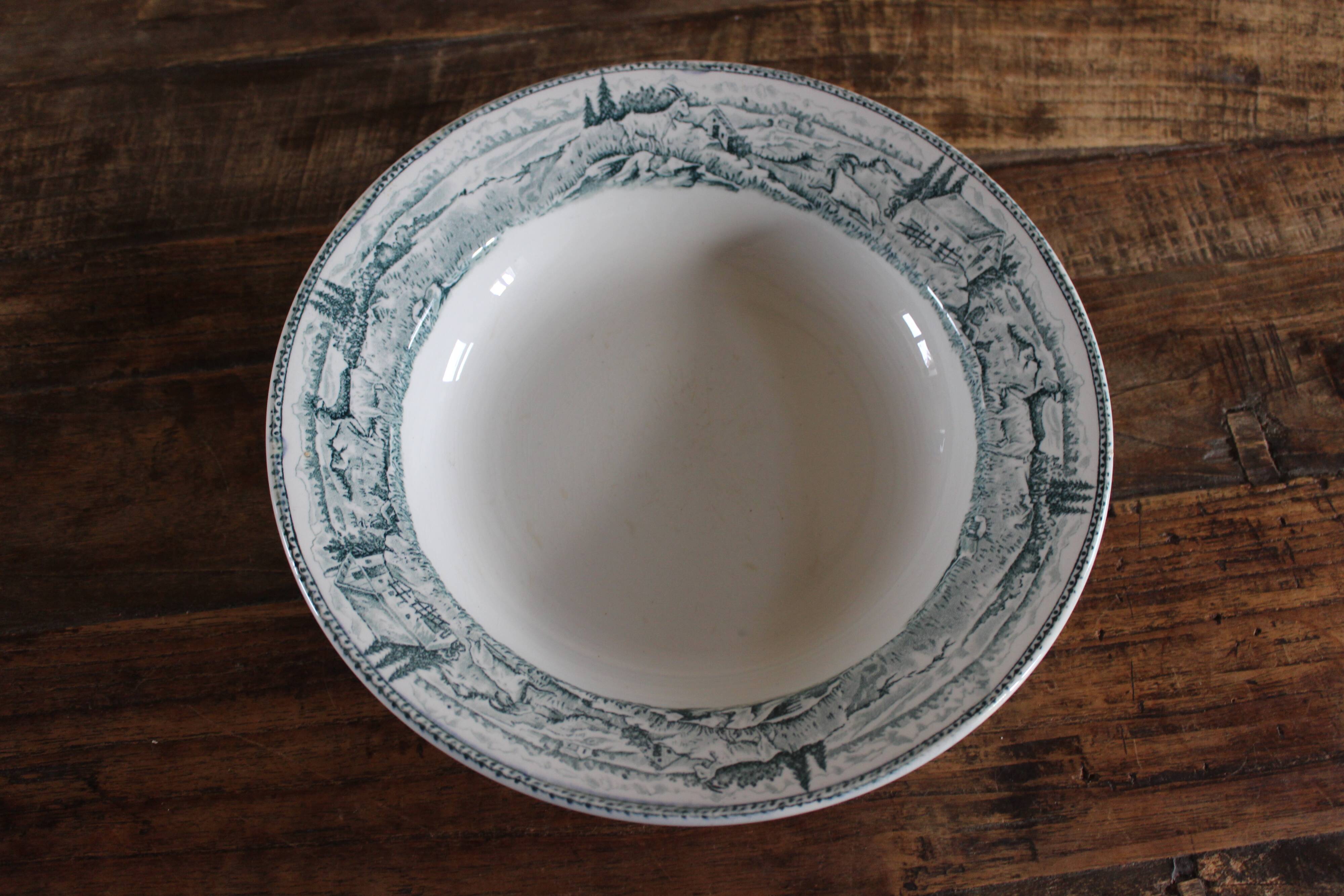 Round hollow dish, Iron earth, Saint Amand, milkmaid model, goat decoration
