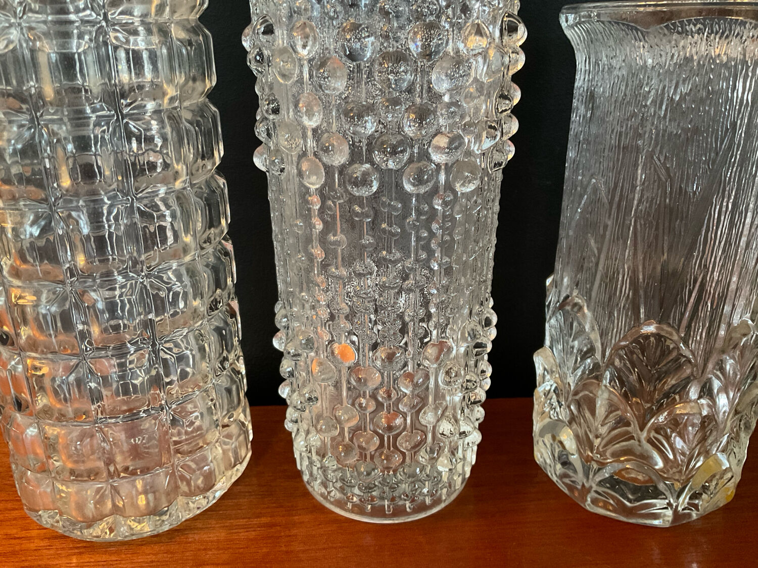 Vintage trio of moulded glass roll vases