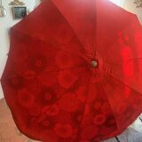 Large floral tilting beach umbrella with cotton fringes, 1960