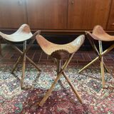 Vintage Mexican tripod stools in bamboo and leather.