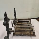pair of chenets with iron grid and drawer