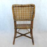 Small child vintage armchair in rattan