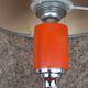 Designer lamp from the 70s in chrome metal and orange lacquered wood