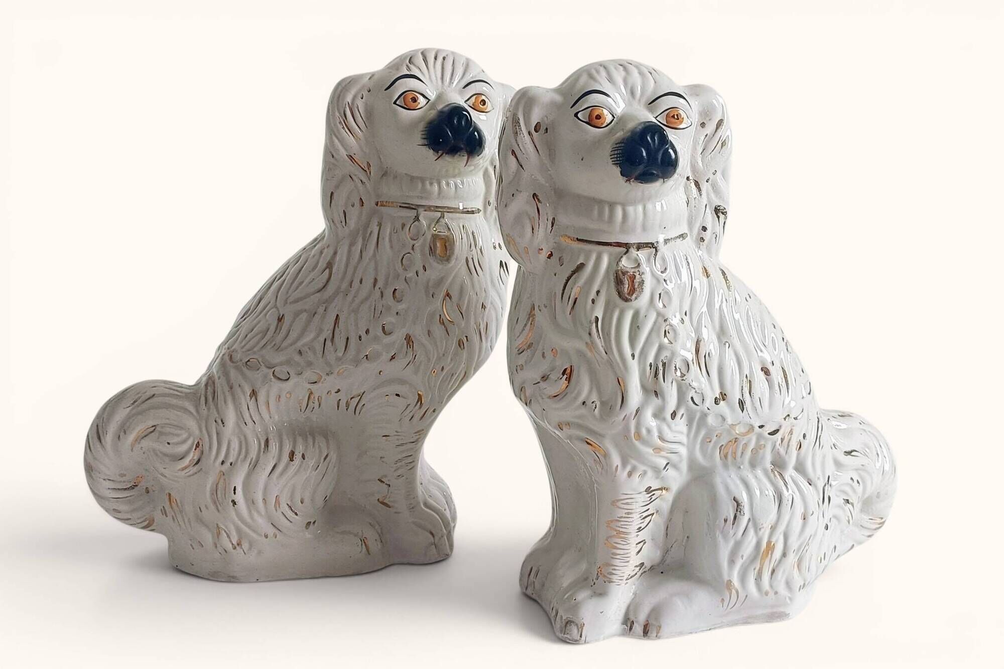 Pair of King Charles Spaniel dogs in Staffordshire majolica style.