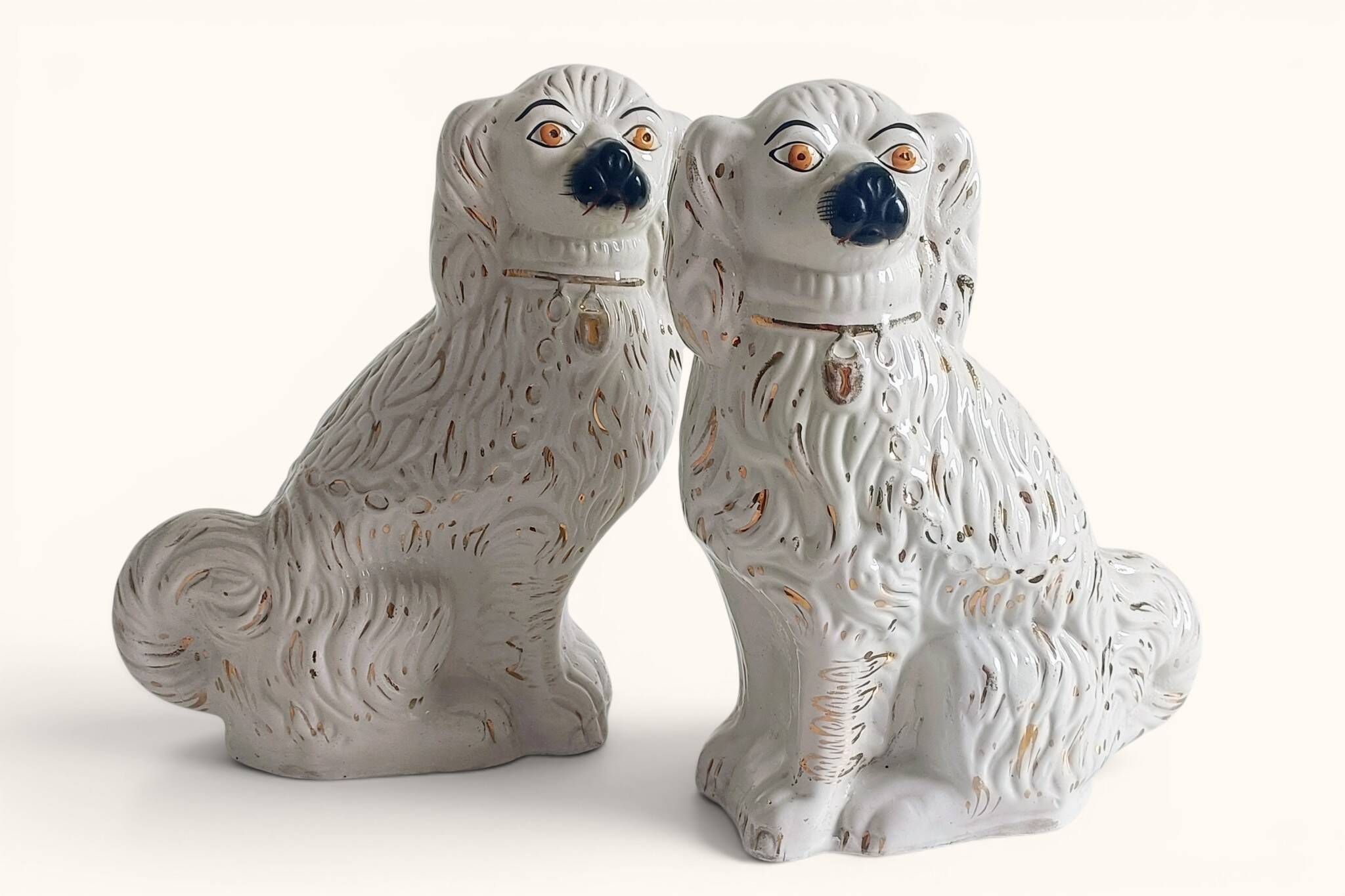 Pair of King Charles Spaniel dogs in Staffordshire majolica style.