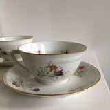 Duo of white Limoges porcelain cups with flowers