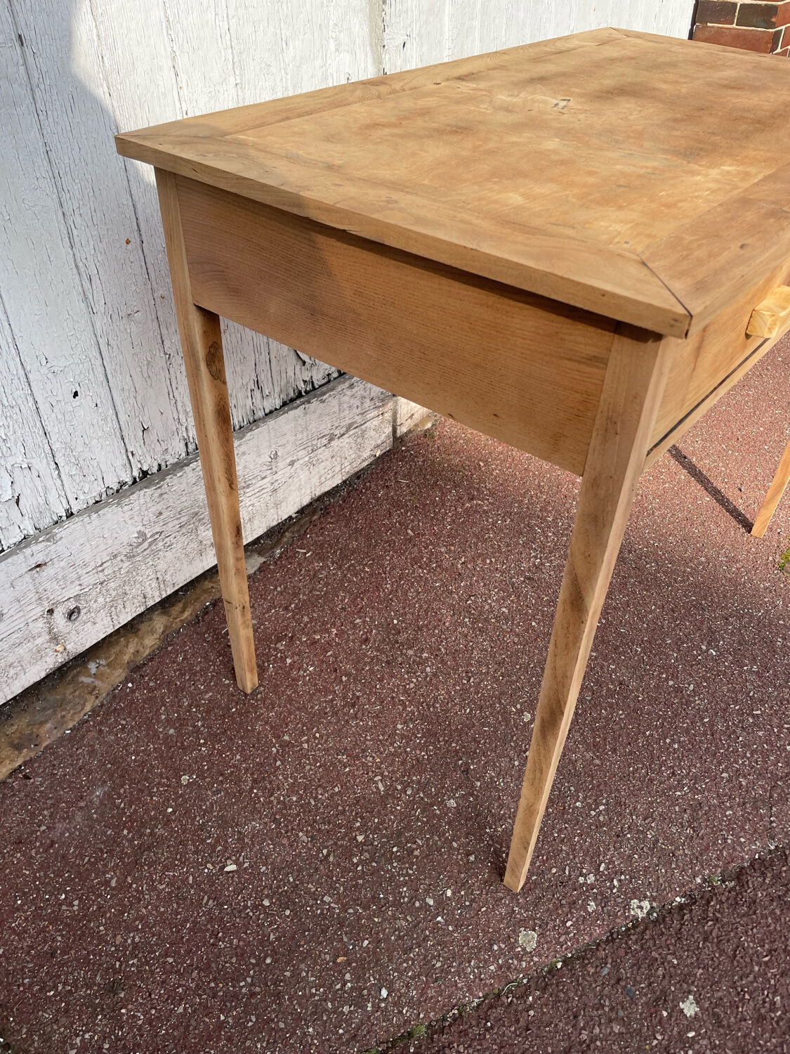 Vintage wooden desk with two drawers.